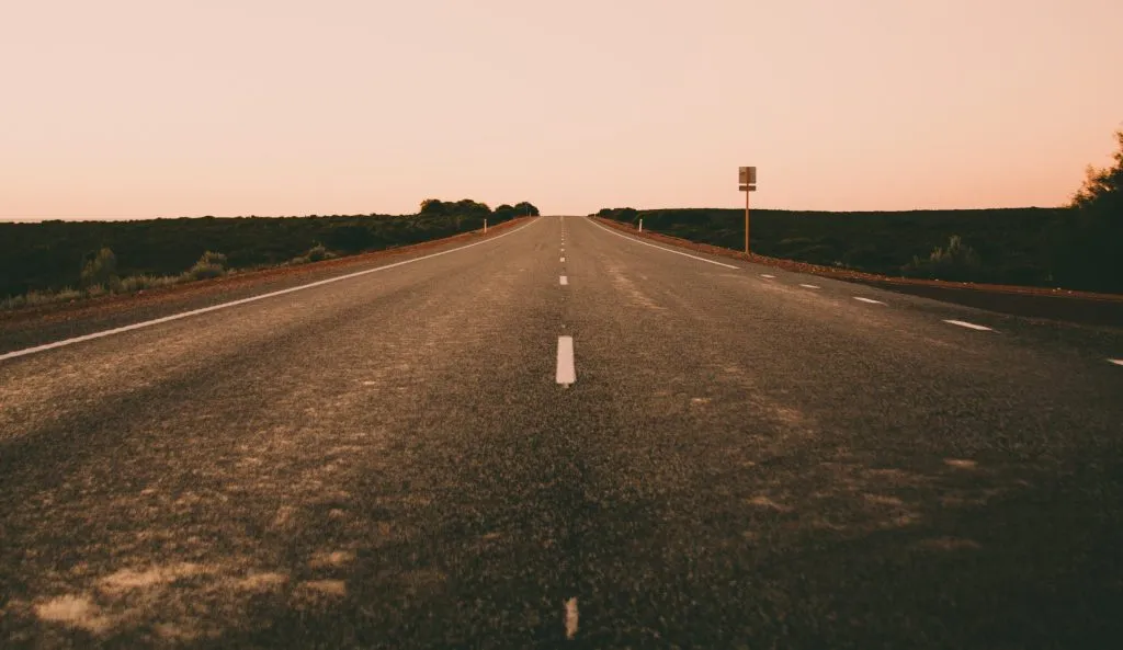 setting financial goals, road, sunset, australia, outback